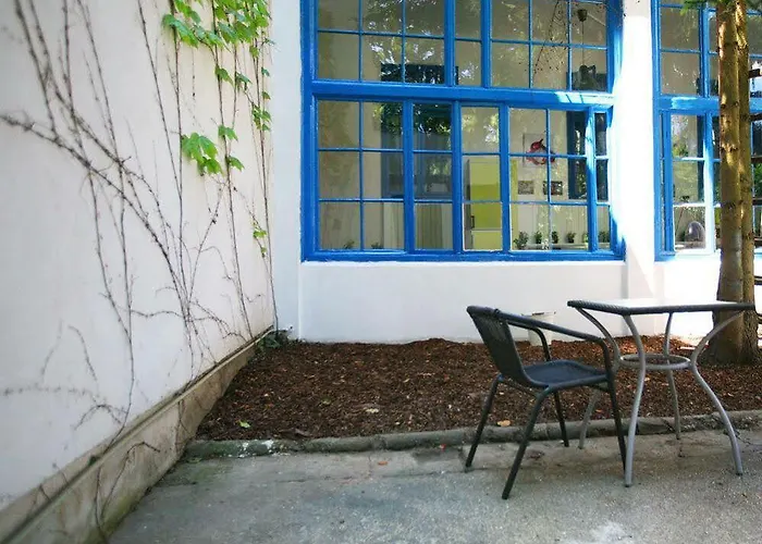 Freddie Next To Mercury Hostal